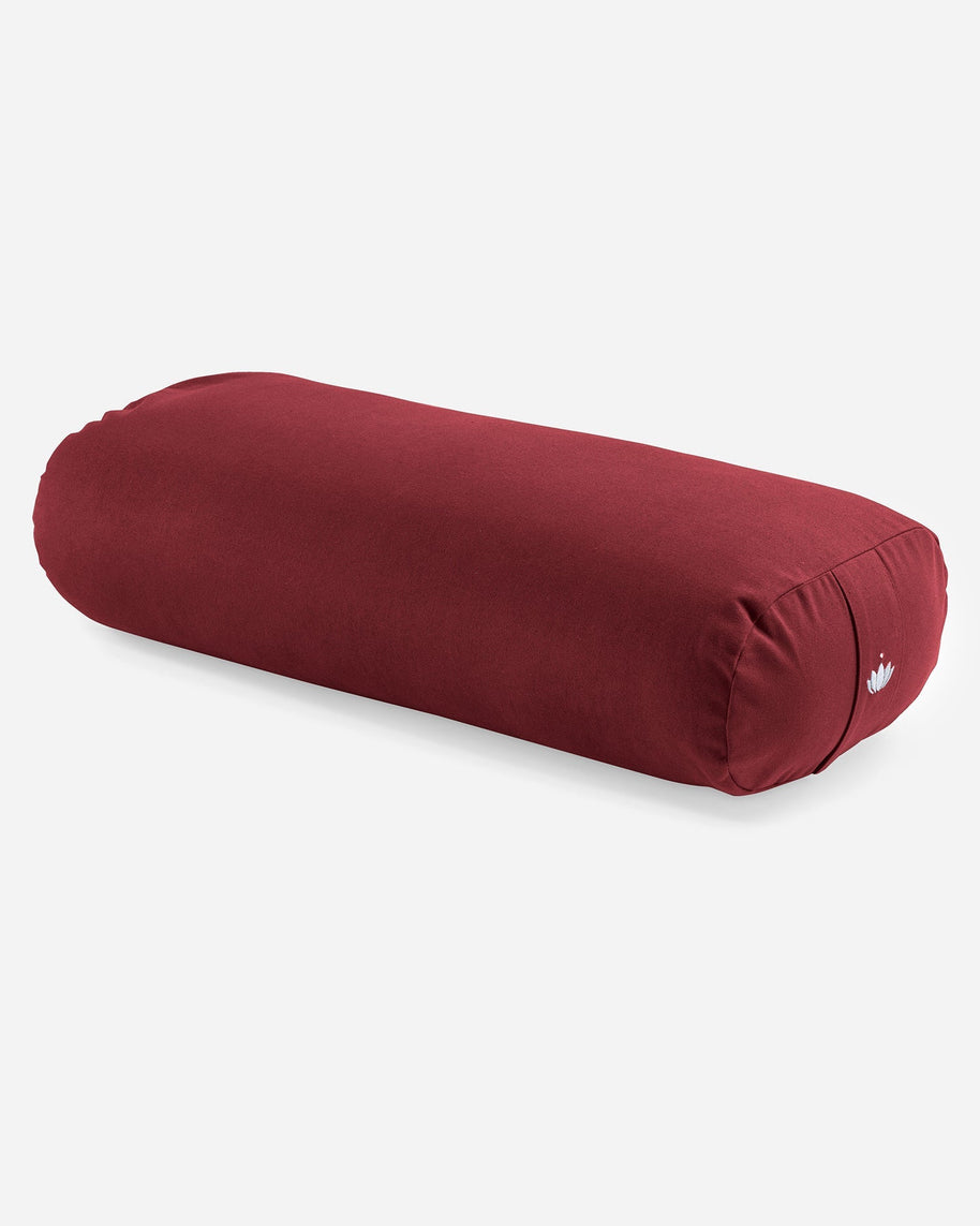 Rechthoekige yoga bolster in zachte kleur voor ontspanning in rood