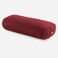 Rechthoekige yoga bolster in zachte kleur voor ontspanning in rood