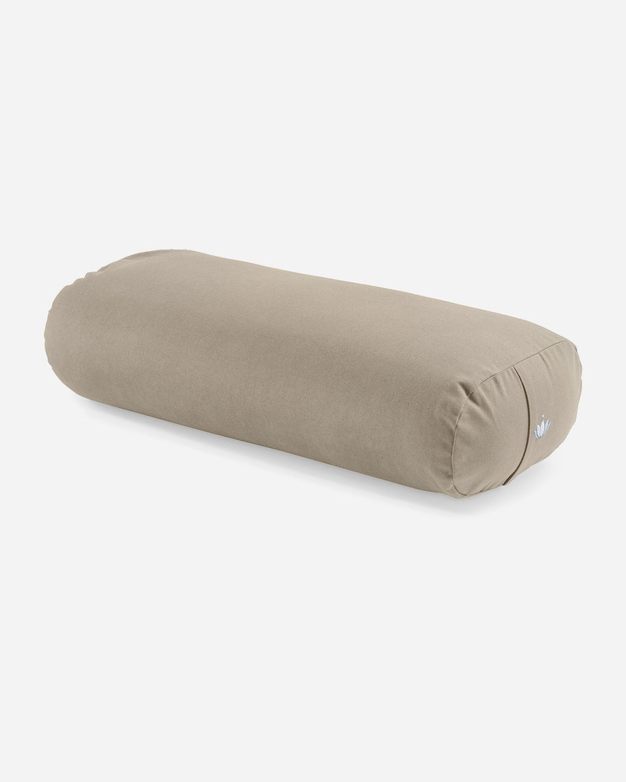 Rechthoekige yoga bolster in zachte kleur voor ontspanning