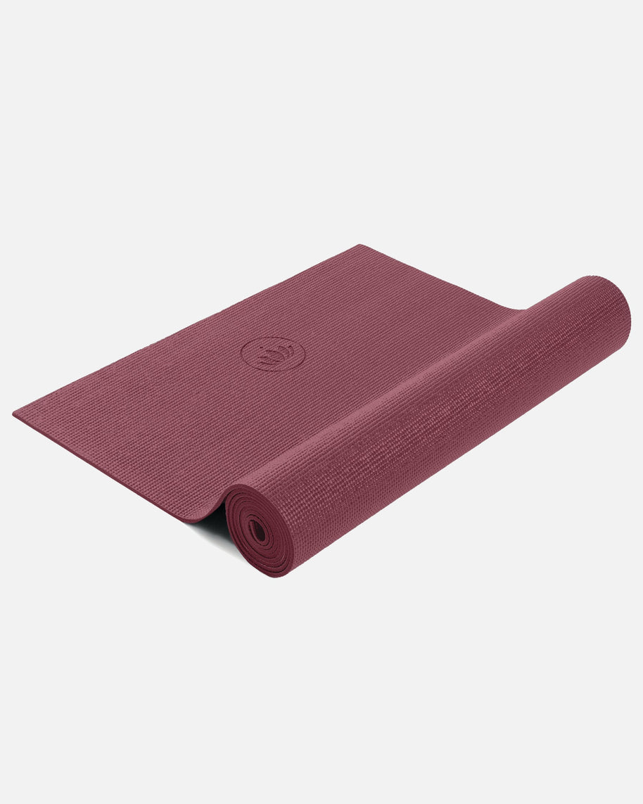 Opgerolde Yoga Mat MUDRA Studio in warm rood