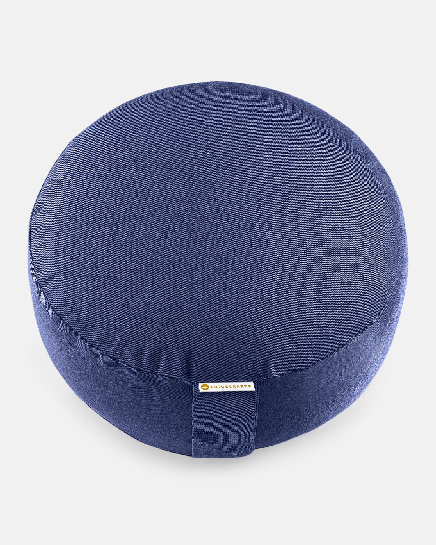 Donkerblauw meditatiekussen van bovenaf gefotografeerd