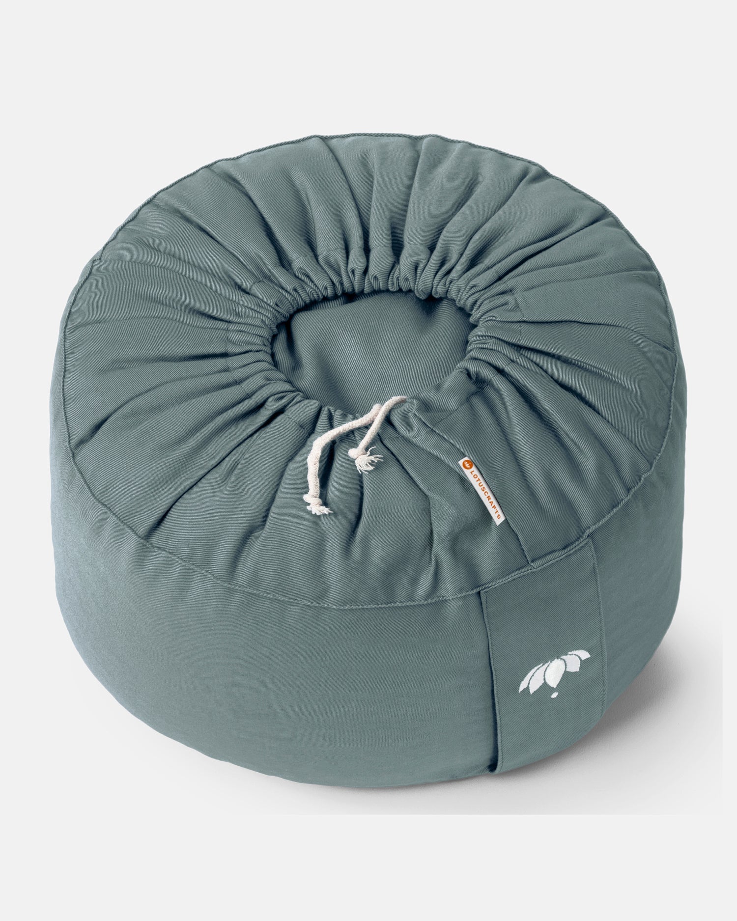 Rond meditatiekussen van Lotuscrafts met geplooide onderkant om gemakkelijk de hoes te kunnen wassen