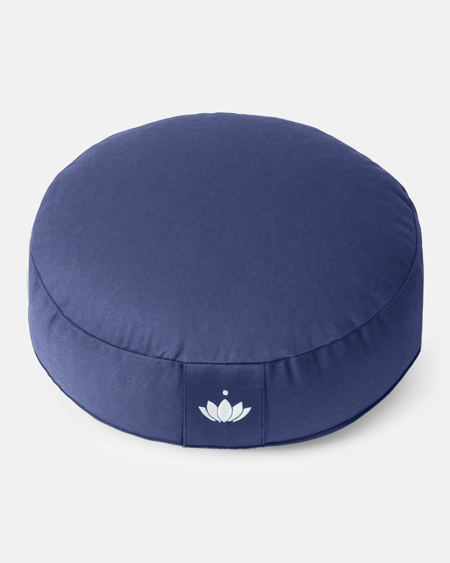 Donkerblauw meditatiekussen van bovenaf gefotografeerd