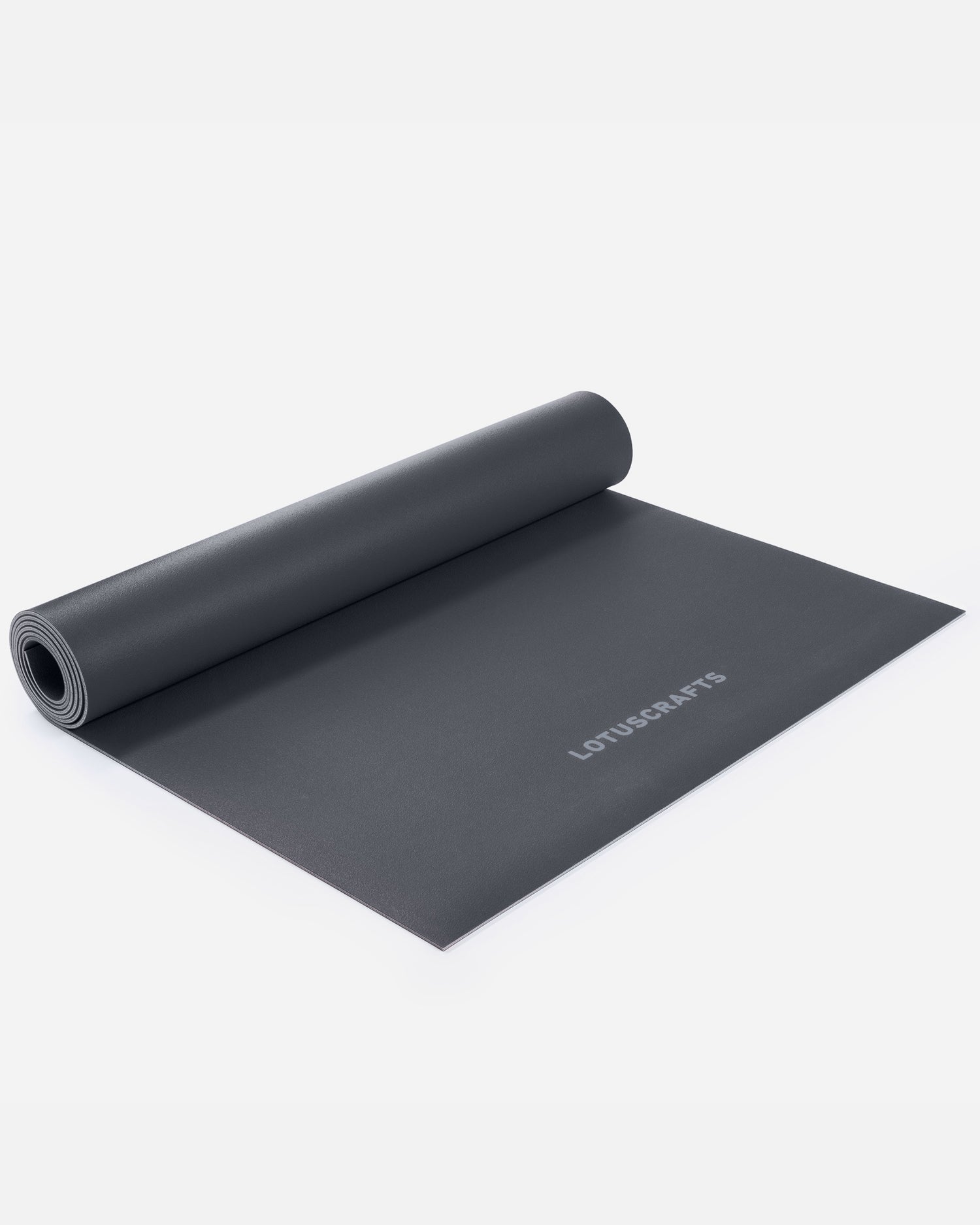 Donkergrijze Arise Yogamat uitgerold met opgerolde rand