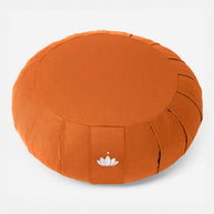 Oranje Zafu meditatiekussen van bovenaf gefotografeerd
