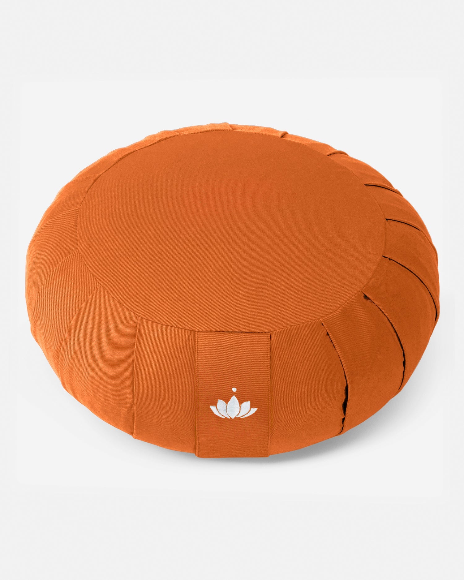 Oranje Zafu meditatiekussen van bovenaf gefotografeerd