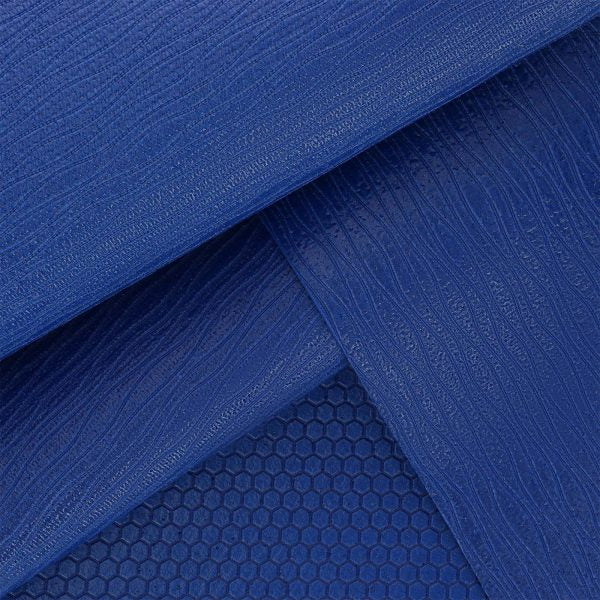 Blauwe yogamat detailopname van materiaal en gripstructuur