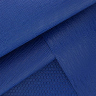 Blauwe yogamat detailopname van materiaal en gripstructuur