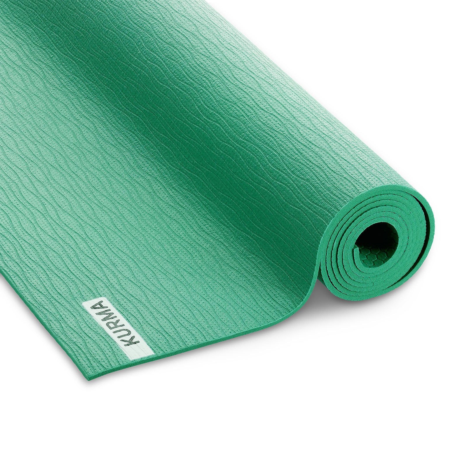 Groene SHIFT yogamat opgerold met antislip structuur zichtbaar