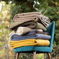 merino wollen deken verschillende kleuren groen blauw beige geel oranje